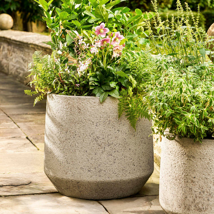 Ledbury grey ficonstone planter by Garden Trading, planted garden view
