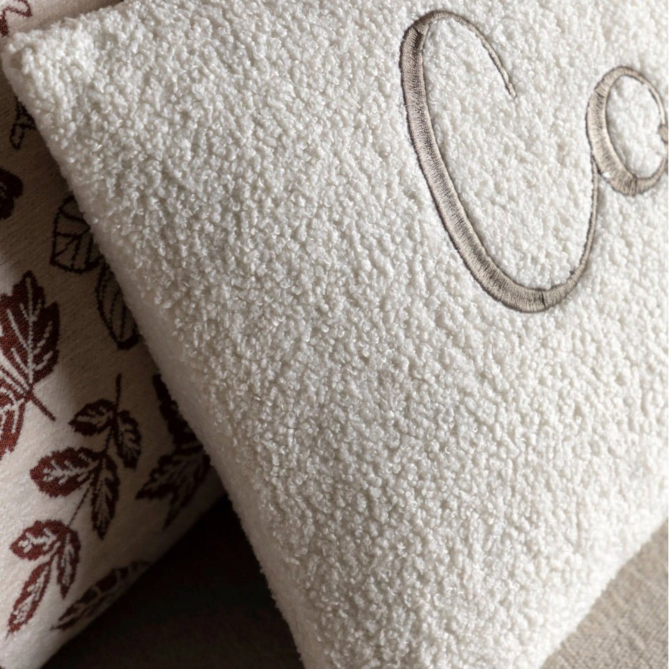 Cosy Embroidered White Boucle Cushion4 - Duck Barn Interiors