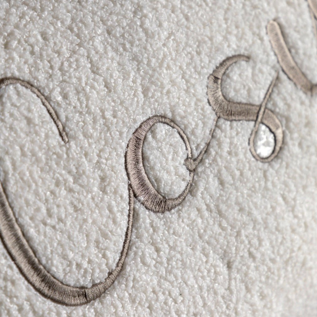 Cosy Embroidered White Boucle Cushion3 - Duck Barn Interiors